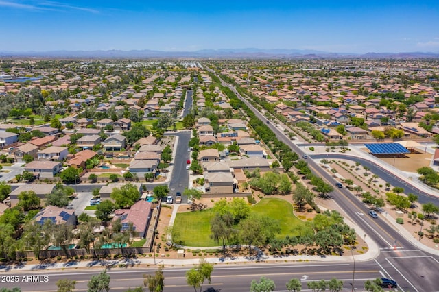 birds eye view of property featuring a mountain view and a residential view