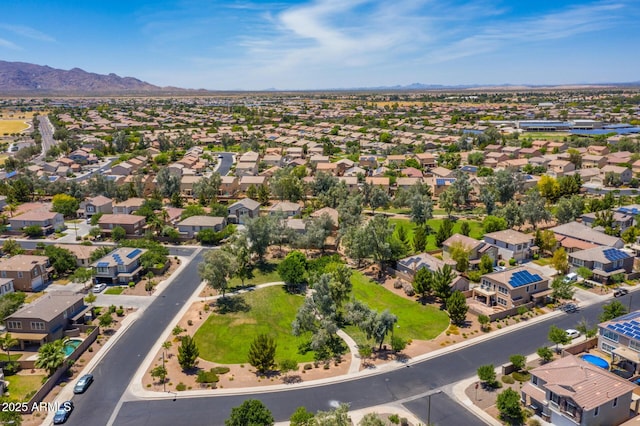 drone / aerial view with a residential view and a mountain view