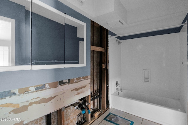 full bath with shower / bathtub combination and tile patterned flooring