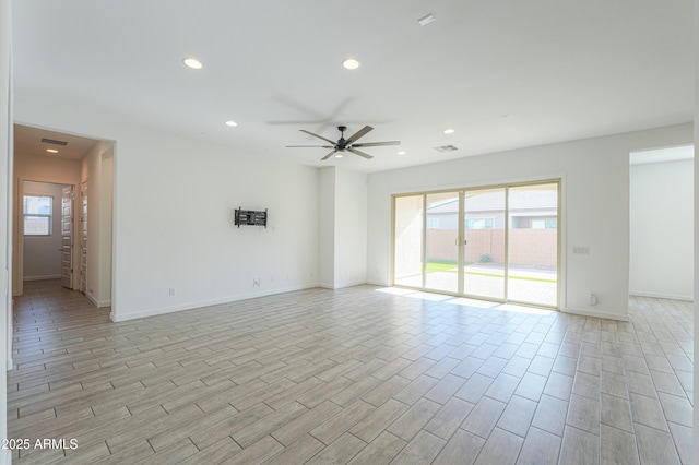 spare room with ceiling fan