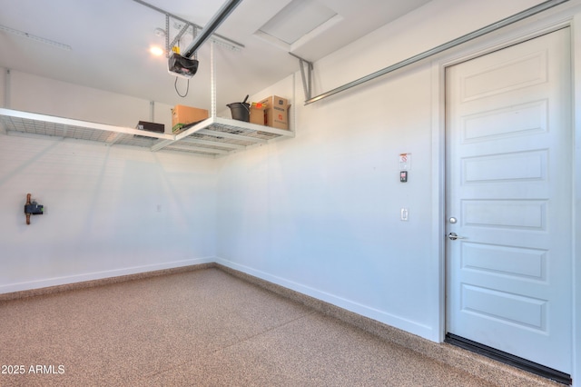 garage featuring a garage door opener