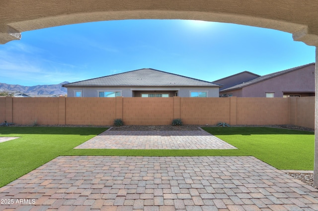 view of patio with a mountain view