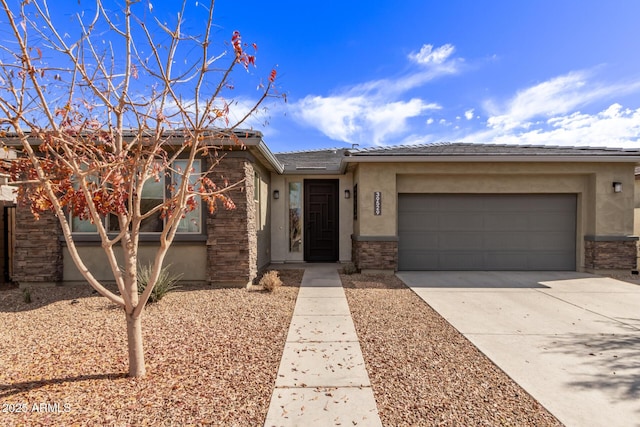 view of front of home with a garage