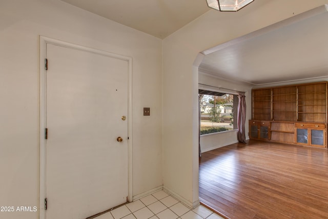 foyer with light tile patterned flooring