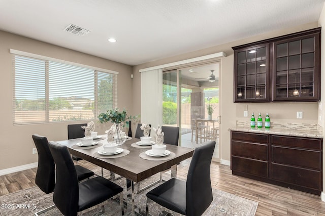 3338 E Coconino Dr, Gilbert, AZ 85298 - dining room with light wood-type flooring, plenty of natural light, a ceiling fan, and recessed lighting