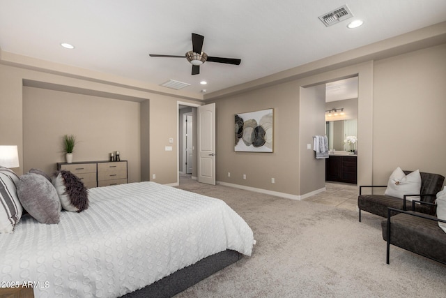 3338 E Coconino Dr, Gilbert, AZ 85298 - bedroom with light colored carpet, recessed lighting, ceiling fan, and ensuite bath