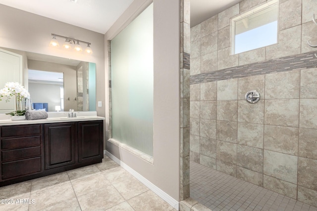 3338 E Coconino Dr, Gilbert, AZ 85298 - bathroom with walk in shower, vanity, and tile patterned floors