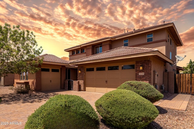 3338 E Coconino Dr, Gilbert, AZ 85298 - view of front of property with an attached garage, stucco siding, driveway, and a tile roof