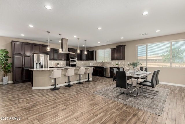 3338 E Coconino Dr, Gilbert, AZ 85298 - dining area featuring light wood-type flooring and recessed lighting