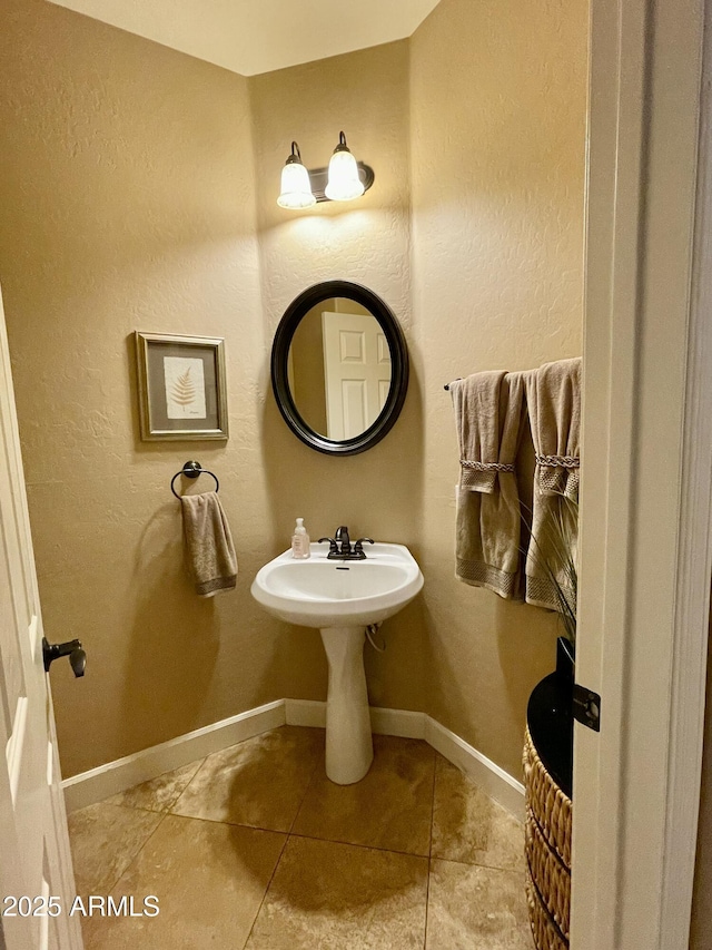 bathroom featuring tile patterned flooring