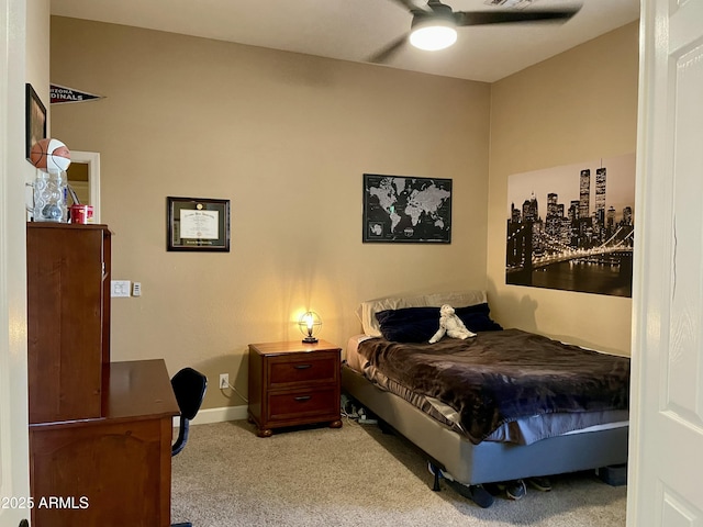 bedroom featuring ceiling fan and light colored carpet