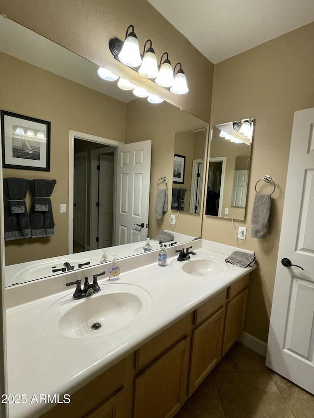 bathroom with vanity and tile patterned flooring