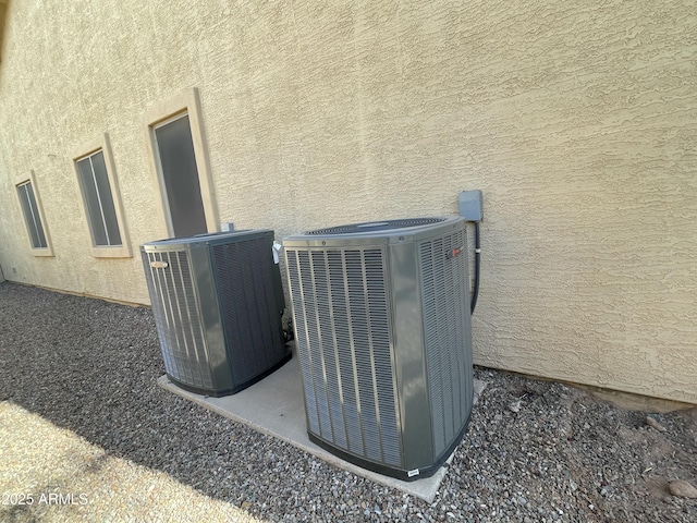 exterior details with central air condition unit