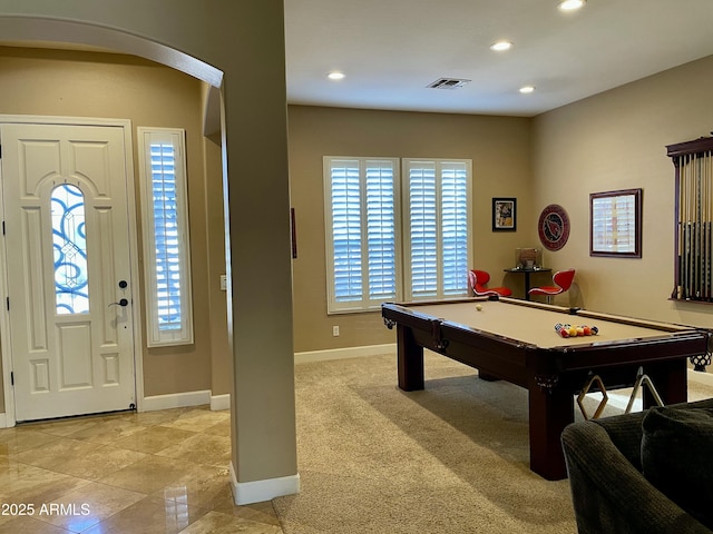 rec room with pool table and light carpet