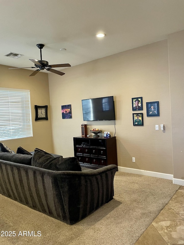 living room with ceiling fan