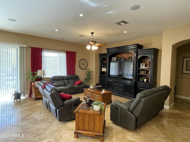 living room with ceiling fan