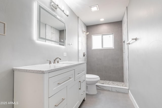 6316 N 23rd Ave, Phoenix, AZ 85015 - full bathroom with tiled shower, toilet, and vanity