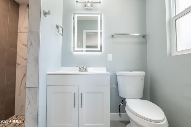 6316 N 23rd Ave, Phoenix, AZ 85015 - full bathroom featuring vanity, toilet, and tiled shower