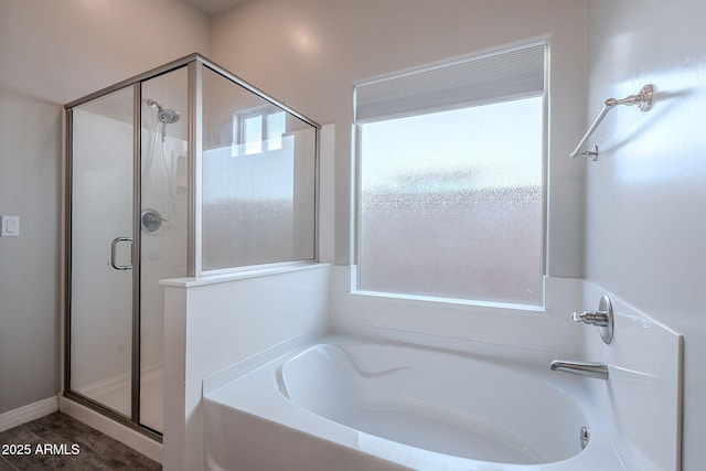 809 W Coles Rd, Phoenix, AZ 85041 - full bathroom featuring a stall shower, a garden tub, and wood finished floors