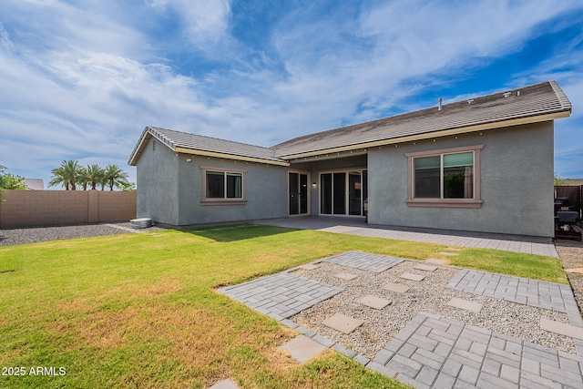809 W Coles Rd, Phoenix, AZ 85041 - rear view of house featuring a patio area, stucco siding, and a tiled roof