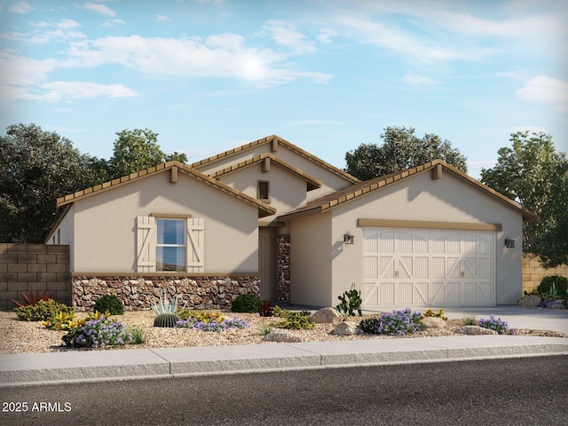 view of front of property featuring a garage