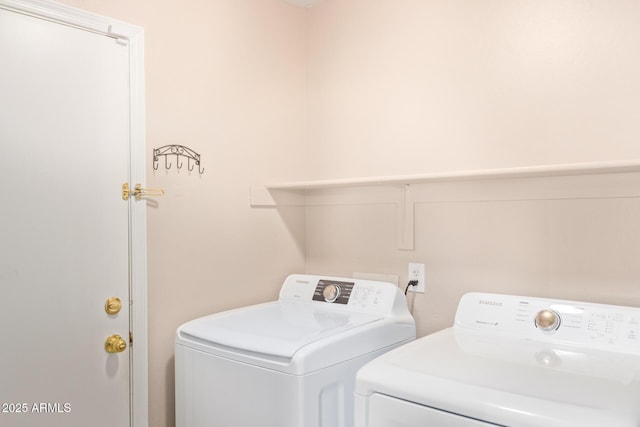 laundry area featuring laundry area and washing machine and dryer