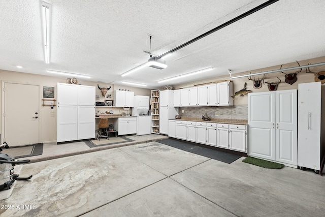 garage with washer / dryer