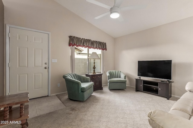 carpeted living room featuring lofted ceiling and ceiling fan