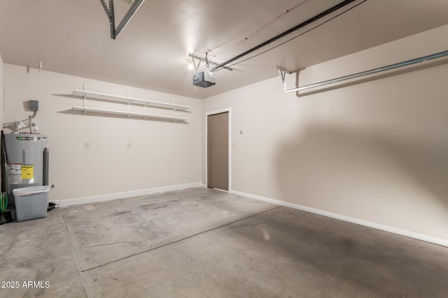 garage featuring a garage door opener and electric water heater