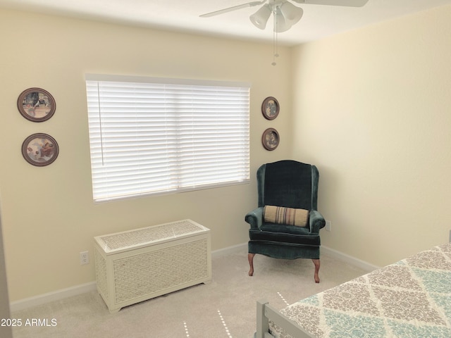 carpeted bedroom featuring ceiling fan and baseboards