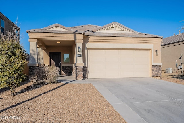 view of front of property with a garage