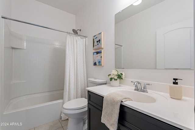 full bathroom featuring toilet, shower / tub combo, vanity, and tile patterned floors