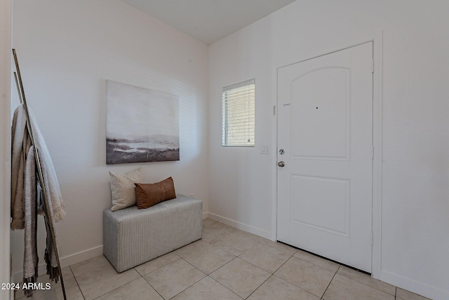 entrance foyer featuring light tile patterned floors