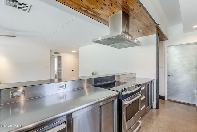 5239 E Waltann Ln, Scottsdale, AZ 85254 - kitchen featuring island range hood, stainless steel electric range oven, stainless steel counters, finished concrete flooring, and recessed lighting