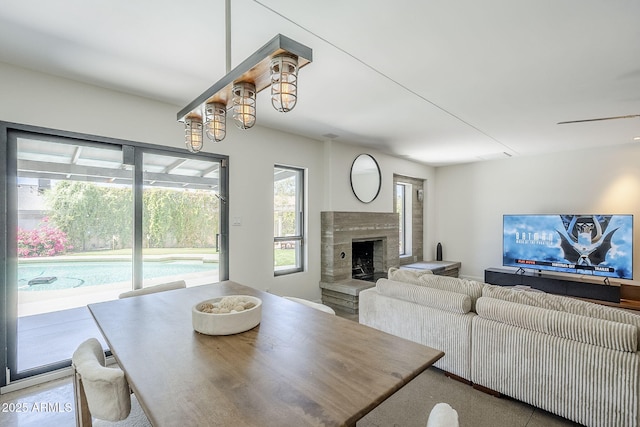 5239 E Waltann Ln, Scottsdale, AZ 85254 - dining room with a fireplace with raised hearth