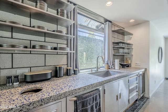 5239 E Waltann Ln, Scottsdale, AZ 85254 - kitchen featuring open shelves, a sink, light stone countertops, baseboards, and recessed lighting