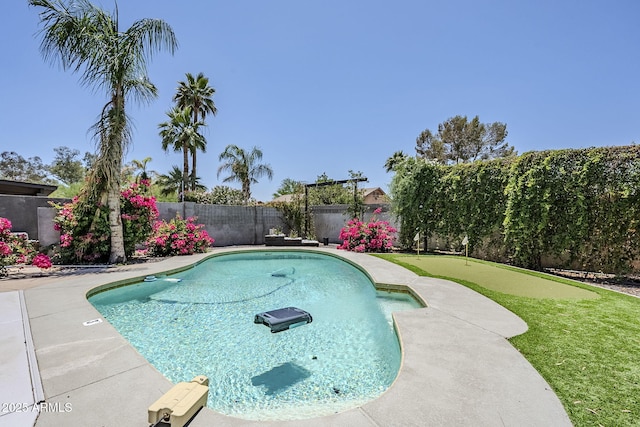 5239 E Waltann Ln, Scottsdale, AZ 85254 - view of swimming pool with a putting green and a fenced backyard
