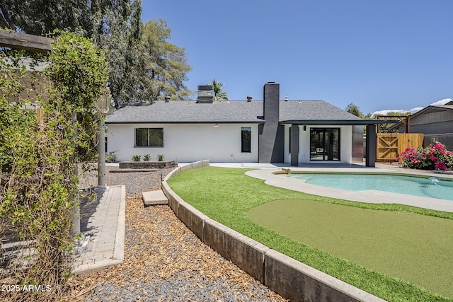5239 E Waltann Ln, Scottsdale, AZ 85254 - rear view of house with an outdoor pool, stucco siding, a fenced backyard, a patio area, and roof with shingles