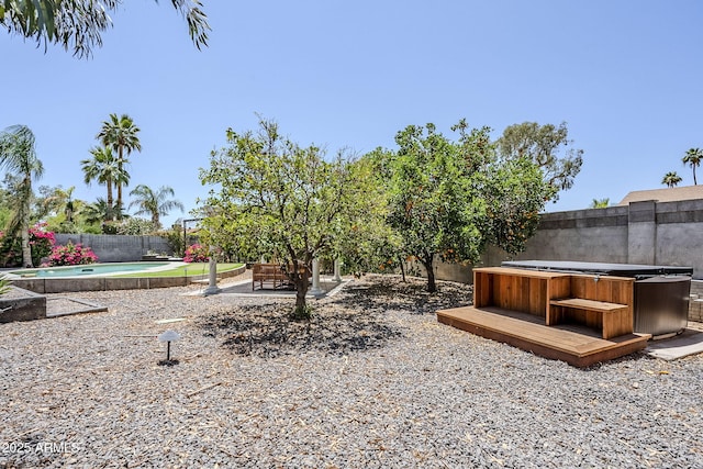 5239 E Waltann Ln, Scottsdale, AZ 85254 - fenced backyard with a hot tub, a patio area, and a wooden deck