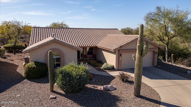 view of front of property featuring a garage