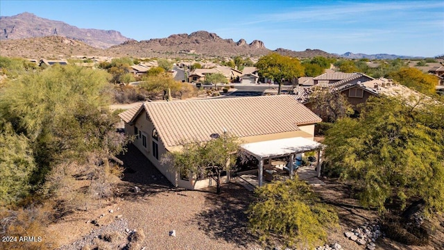 drone / aerial view featuring a mountain view