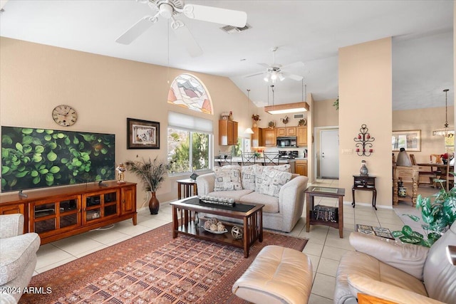 tiled living room featuring high vaulted ceiling