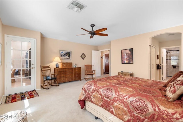 carpeted bedroom with ceiling fan, connected bathroom, and a closet