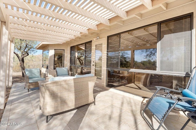 view of patio / terrace with a pergola and an outdoor living space