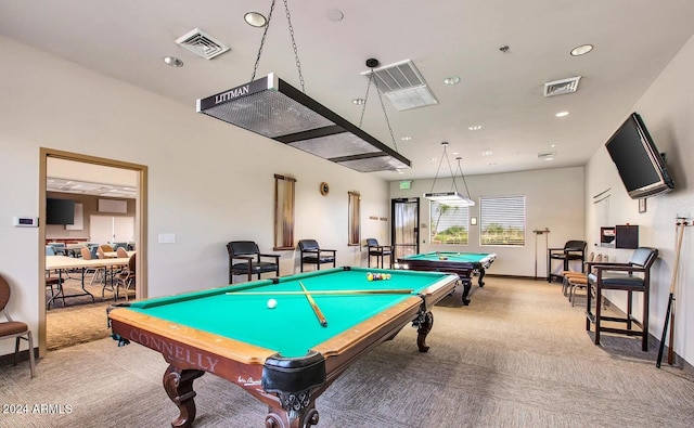 recreation room with light carpet and pool table