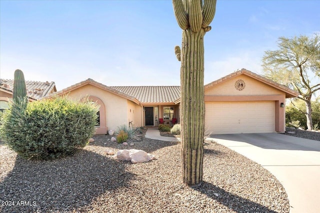 single story home with a garage