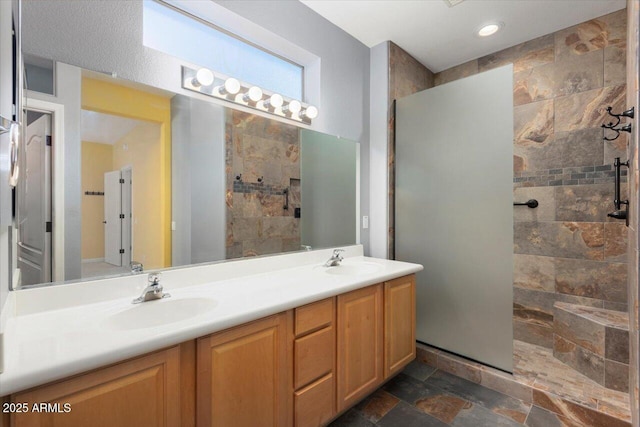 bathroom featuring vanity and walk in shower