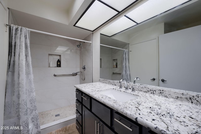 bathroom with vanity and a shower with curtain