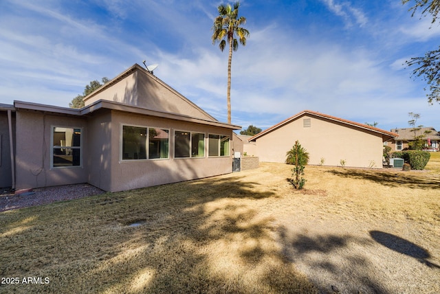 exterior space with a lawn