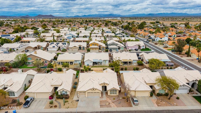 aerial view with a mountain view and a residential view